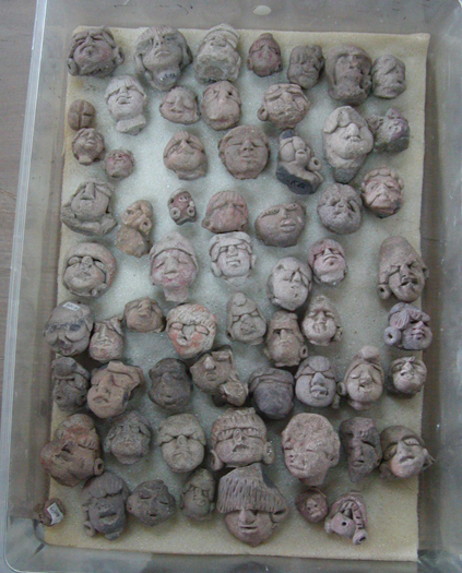 Fragmentary, Middle Preclassic ceramic figurine heads with puffy facial features from the archaeological site of La Blanca, Guatemala, now in the Shook Collection archive, Department of Archaeology, Universidad del Valle, Guatemala (photo by Robert Rosenswig, courtesy of Marion Popenoe de Hatch).