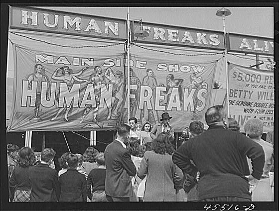 A freak show in Rutland, Vermont in 1941. Photo by Jake Delano for the Office of War Information in the Library of Congress. 