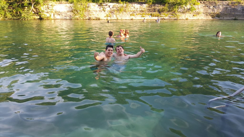 Students swimming at Barton Springs Pool