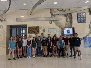 photo of the group of students and graduate students all together in the building lobby