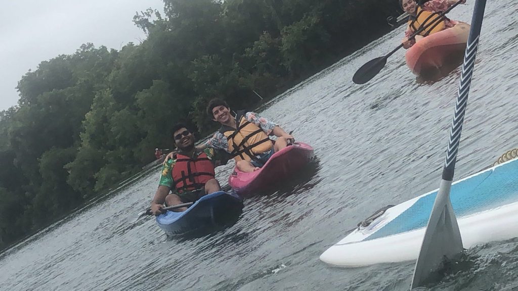 students on kayaks