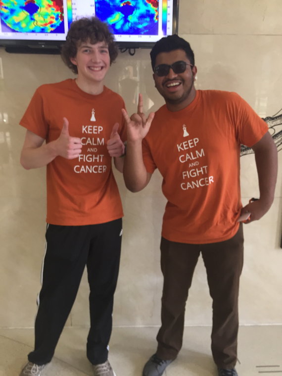 summer scholars pose in their t-shirts that say "keep calm and fight cancer"