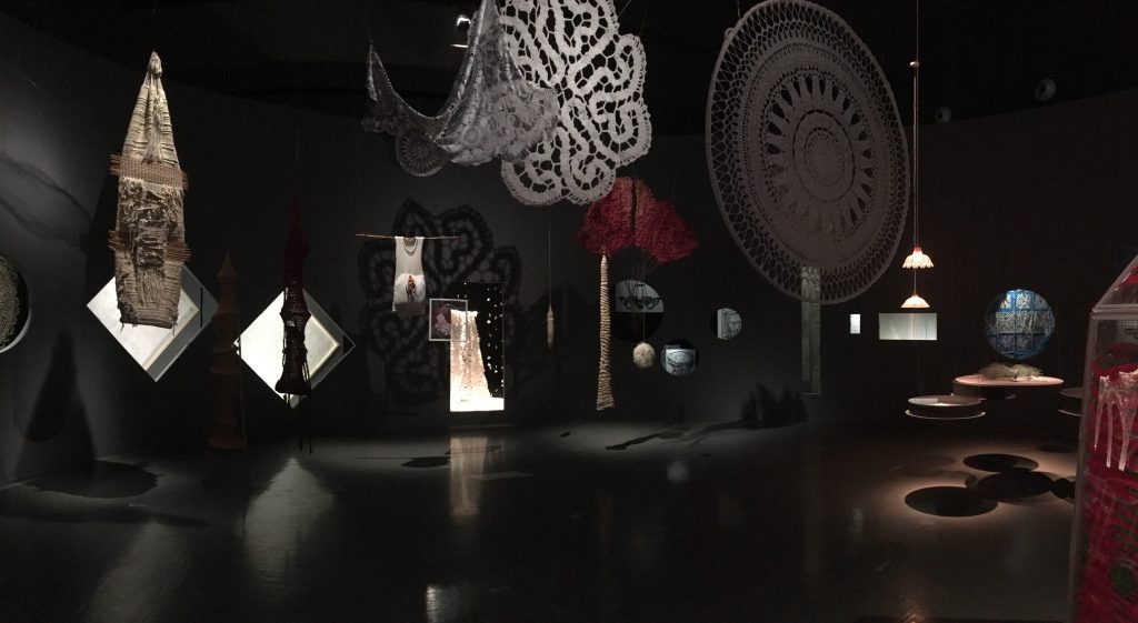 First view when entering exhibit; giant doilies hanging from ceiling