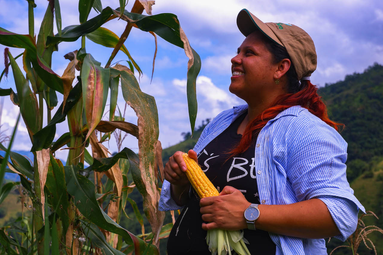 Alex Diamond. "Alejandra, farmer and agricultural technician, subverts traditional gender roles in rural Colombia that suggest it is men who plant and harvest crops like corn."