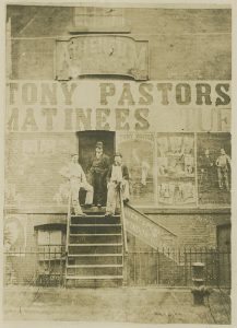 Aimé Dupont (American, 1842-1900), [Stage door of Pastor's Theatre], ca. 1877. Gelatin silver print, 16.5 x 10.8 cm. Theater Biography Collection, Harry Ransom Center.