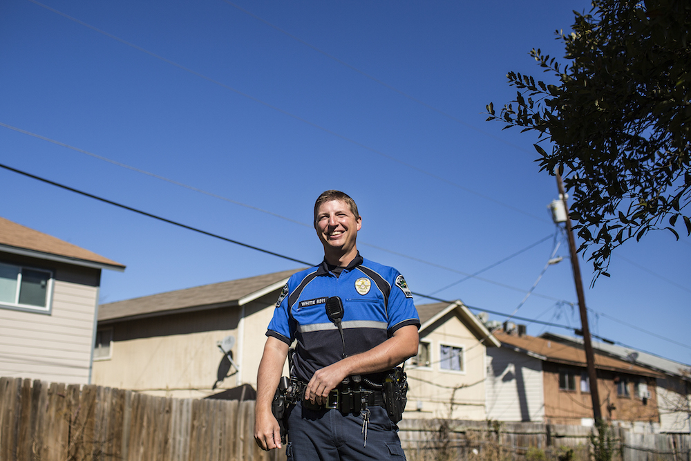 Officer White on his walking patrol in the Sam Rayburn area of Rundberg.