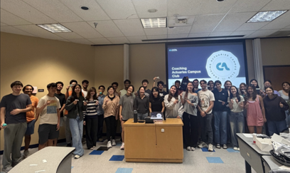 Picture of Actuarial Science Club members posing at the front of a classroom