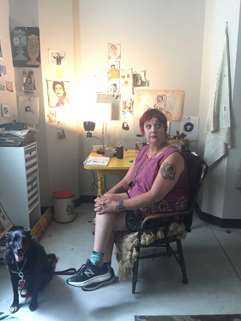 woman sitting in studio space