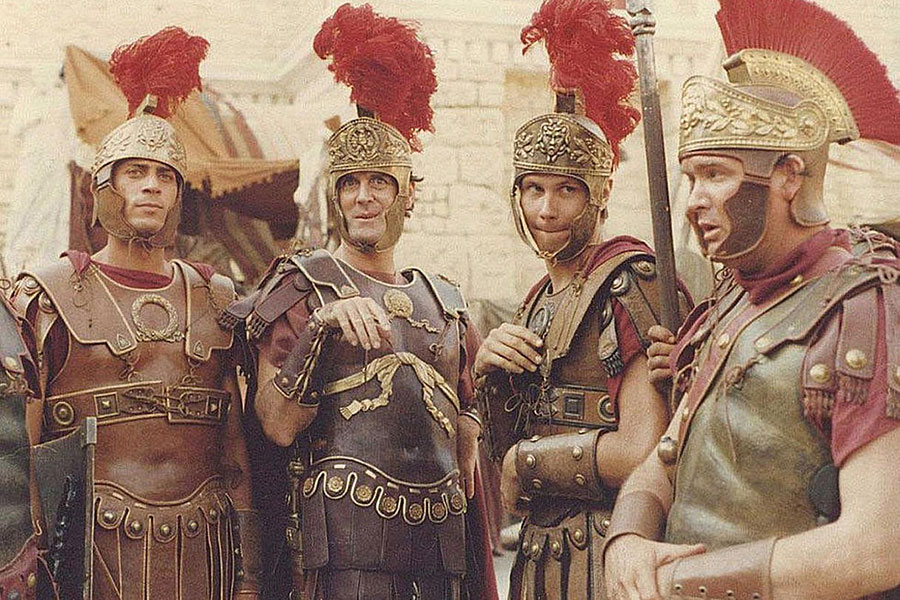 screenshot from Life of Brian of four roman soldiers