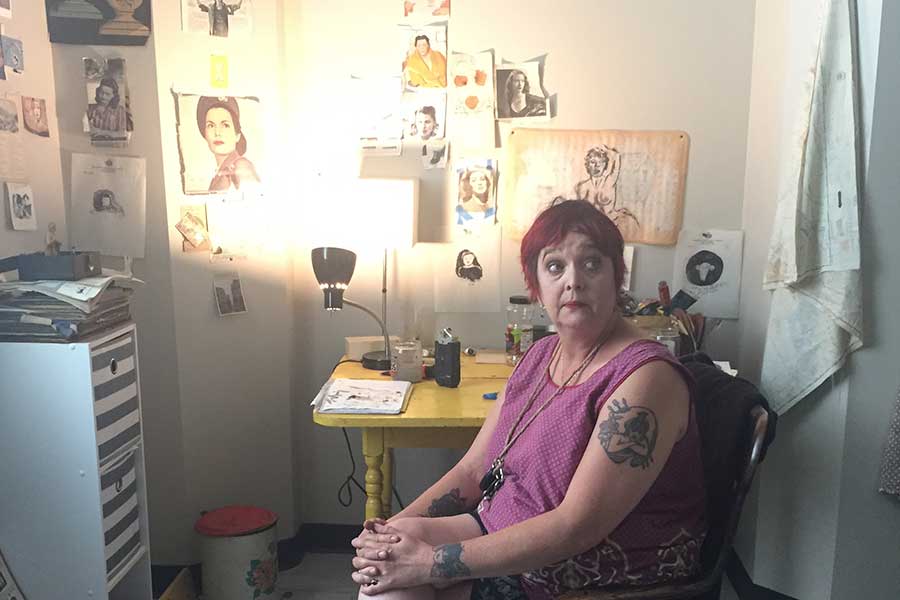 woman sitting in studio space