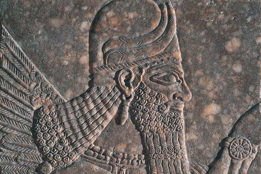 cropped detail of rock engraving showing human figure