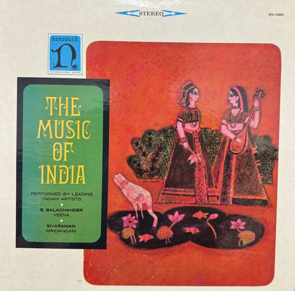 Photograph of cover art of a vinyl disc of the music of India, with two women playing music, and a bird drinking water from a pond