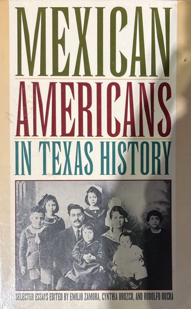 Book cover of Mexican Americans in Texas History. The title appears in green, red, and blue lettering. Below the title, there's a black-and-white photograph of a family (mother, father, and six children). 