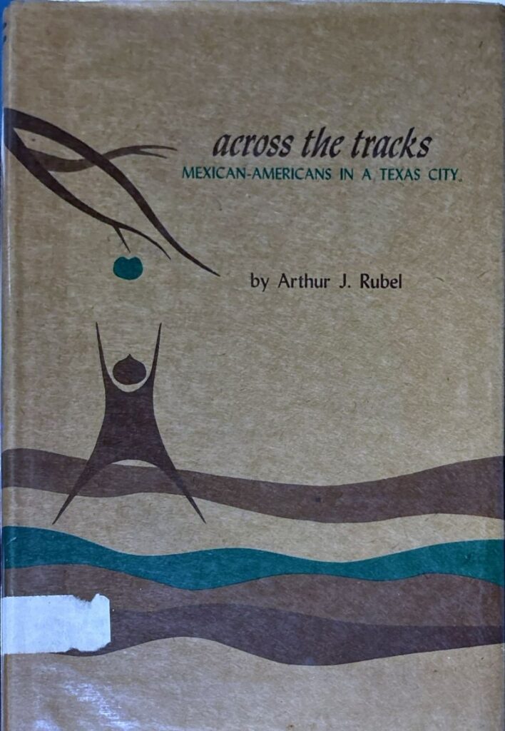 Book cover of Across the Tracks: Mexican-Americans in a Texas City. The cover features an illustration of a figure with arms raised trying to reach a fruit on a tree branch, above blue and brown waves.