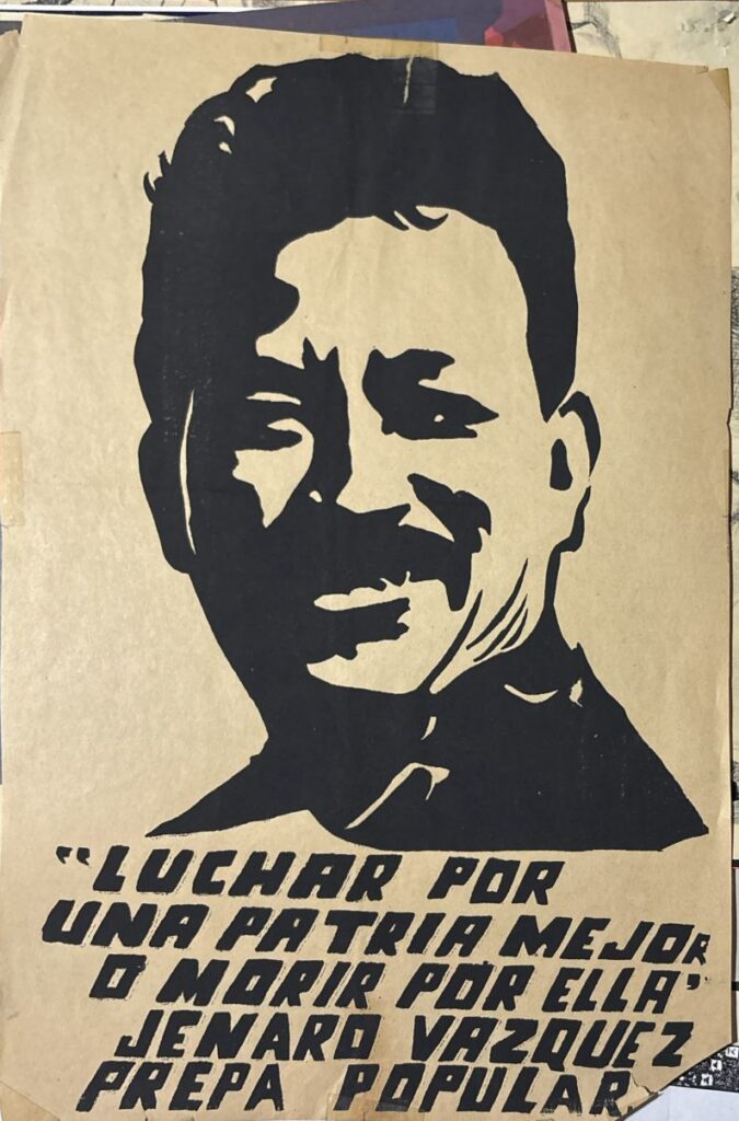 Print of a man with the quote "luchar por una patria mejor o morir por ella" meaning "Fight for a better country or die for it." This quote is attributed to Jenaro Vasquez, potentially referring to Genaro Vázquez Rojas, a Mexican school teacher, organiser, militant, and guerrilla fighter. Below this is the phrase "prepa popular,"