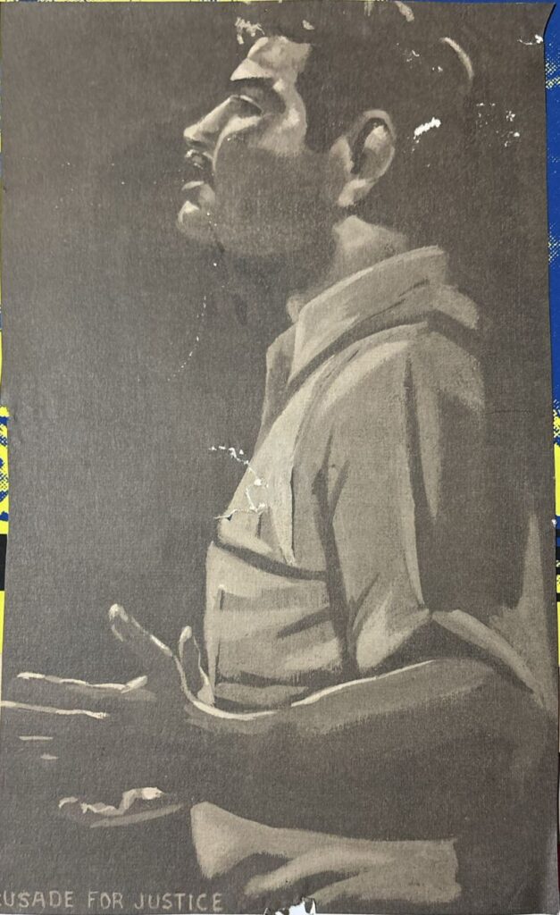 This drawing features the profile of an unknown man. The bottom of the drawing has cut-off text that says "USADE FOR JUSTICE," presumably cut off from "CRUSADE FOR JUSTICE."