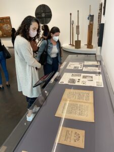 Two students examine documents at the Museum of Fine Arts, Houston