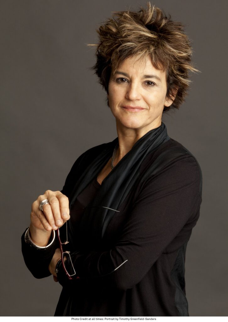 Portrait of curator giving lecture, Mari Carmen Ramirez