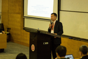 Photo of Dr. Zhang presenting at the 2018 International Conference on Future Urban Development: Sustainable City-Region Governance.
