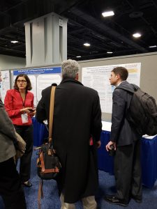 Picture of Dr. Sciara with her CM2 poster, "Regional Land Use and Transportation Sustainability: Metropolitan Planning Organizations (MPOs) and the Art of Nudging Local Governments"