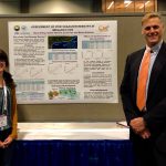Picture of Nelida Herrera and Brian Wolshon with their CM2 poster, "Assessment of post-disaster reentry in Megaregions”