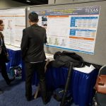 Picture of Yantao Huang with his CM2 poster with Dr. Kara Kockleman, "How Will Self-Driving Vehicles Affect Megaregion Traffic? The Case of the Texas Triangle"