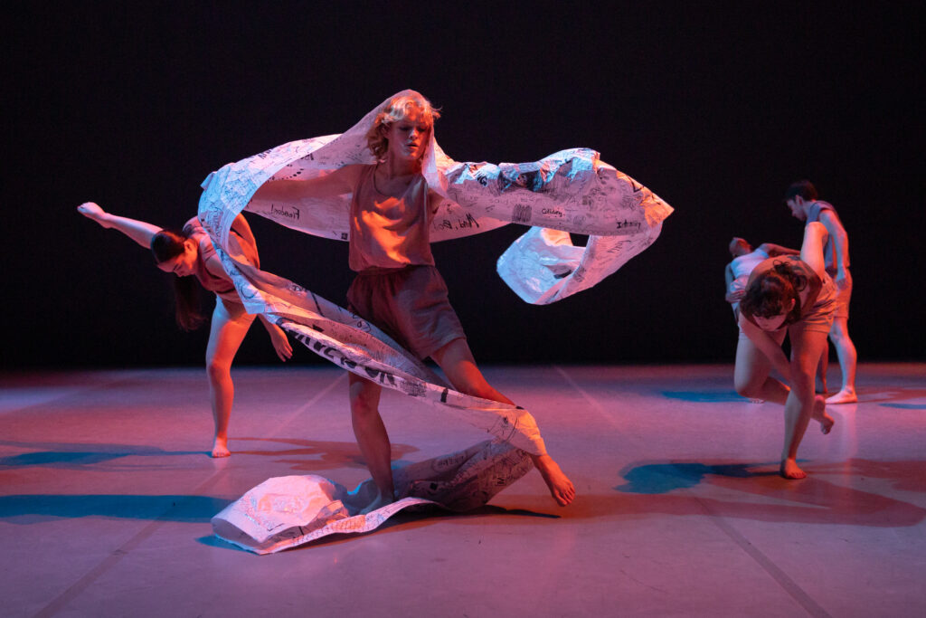 Students onstage dancing.