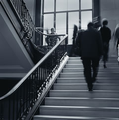 Image of people walking up stairs