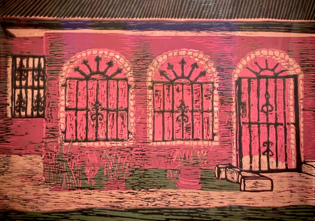 painting of a pink house