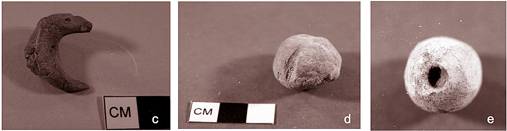 Crescent-shaped and two spheres from 'Ain Ghazal