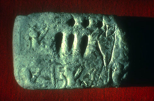 (Fig. 3) Pictographic tablet featuring an account of 33 measures of oil, from Godin Tepe, Iran (Courtesy Dr. T. Cuyler Young, Royal Ontario Museum, Toronto)