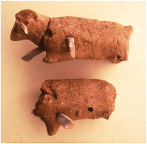 Pair of animals stabbed with flint bladelets