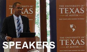 A man speaking at a podium