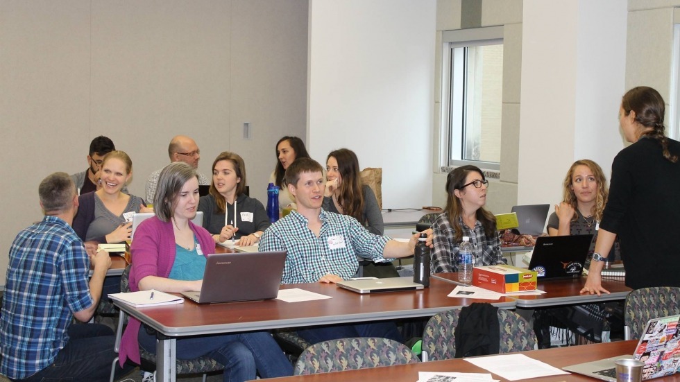 Isaac, Mariana, Caitlin, and Tessa at a BEACON Public Engagement workshop