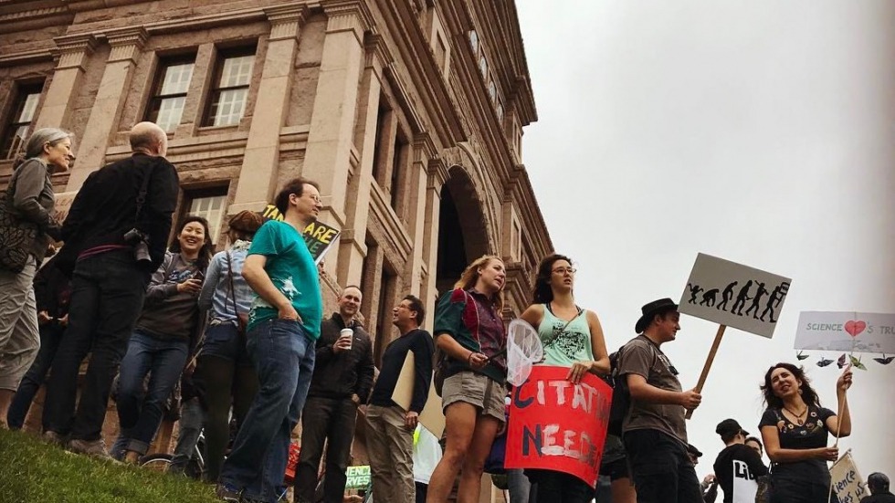 Hofmann lab members stand with other IB scientists at the Science March in Austin