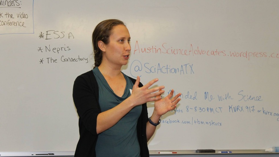 Tessa speaks with a group of scientists at a BEACON Public Engagement workshop