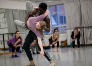 Two Dance majors rehearse in a Winship practice studio. 