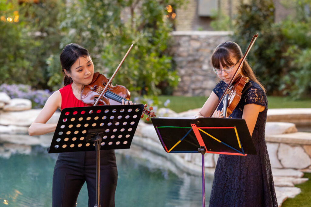 Two violin students perform at the 2022 Advisory Council Reception