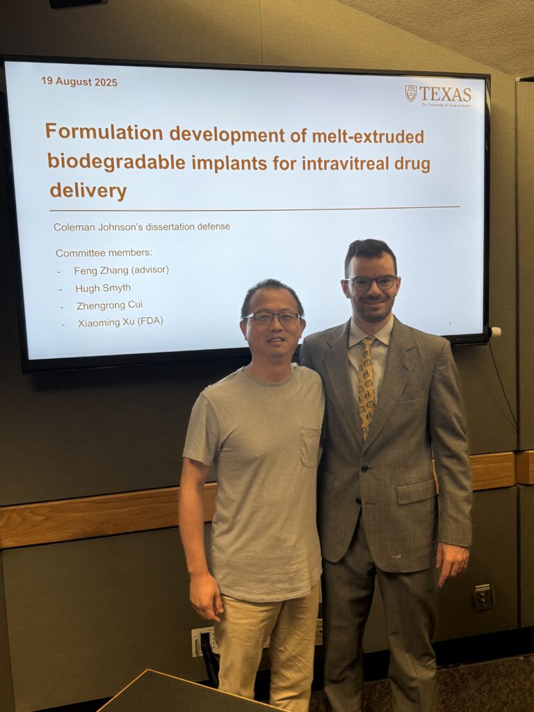 Picture of Coleman Johnson with Feng Zhang after her graduation.