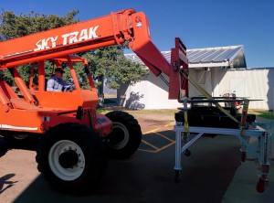 The Focal Plane Assembly, which will hold all of the guide probes and science fibers, arrives at the HET and is moved into the loading bay and then into the dome.
