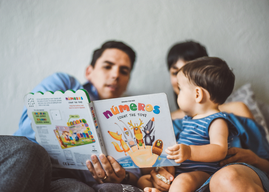 Father reading to baby