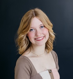 Woman with blonde hair smiling