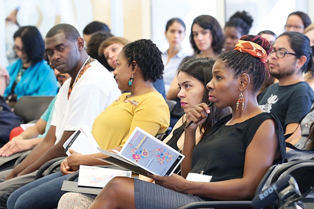 Students and guests attend the opening of the 36th annual ILASSA Student Conference, "Utopia and Reality: Latin America Confronting Globalization." Photo: Robert Esparza.