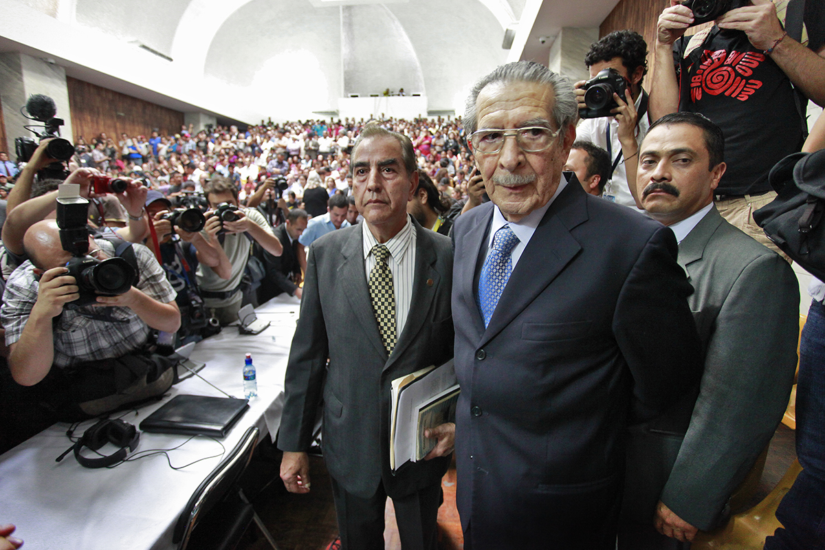 Former chief of state Efraín Rios Montt with his lawyers, seconds after he was pronounced guilty of genocide and crimes against humanity by Judge Yasmin Barrios. Supreme Court of Justice, Guatemala, May 10, 2013. © Daniel Hernández-Salazar, 2013.