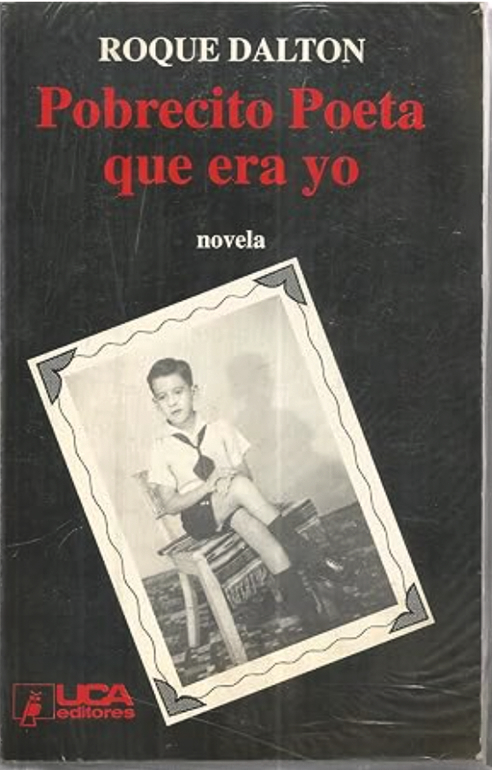 A black book cover Roque Dalton's novel "Pobrecito poeta que era yo" featuring a black-and-white photo of Roque Dalton as a child, seated on a wooden chair that has a woven rug on it. He is about 7 or 8 years hold, hands folded in his lap, legs crossed. He is wearing a white short-sleeved shirt with a collar, a neckerchief of a dark color, dark shorts, and dark socks and shoes, possibly a school uniform.