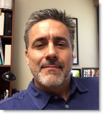 headshot of Raul Longoria