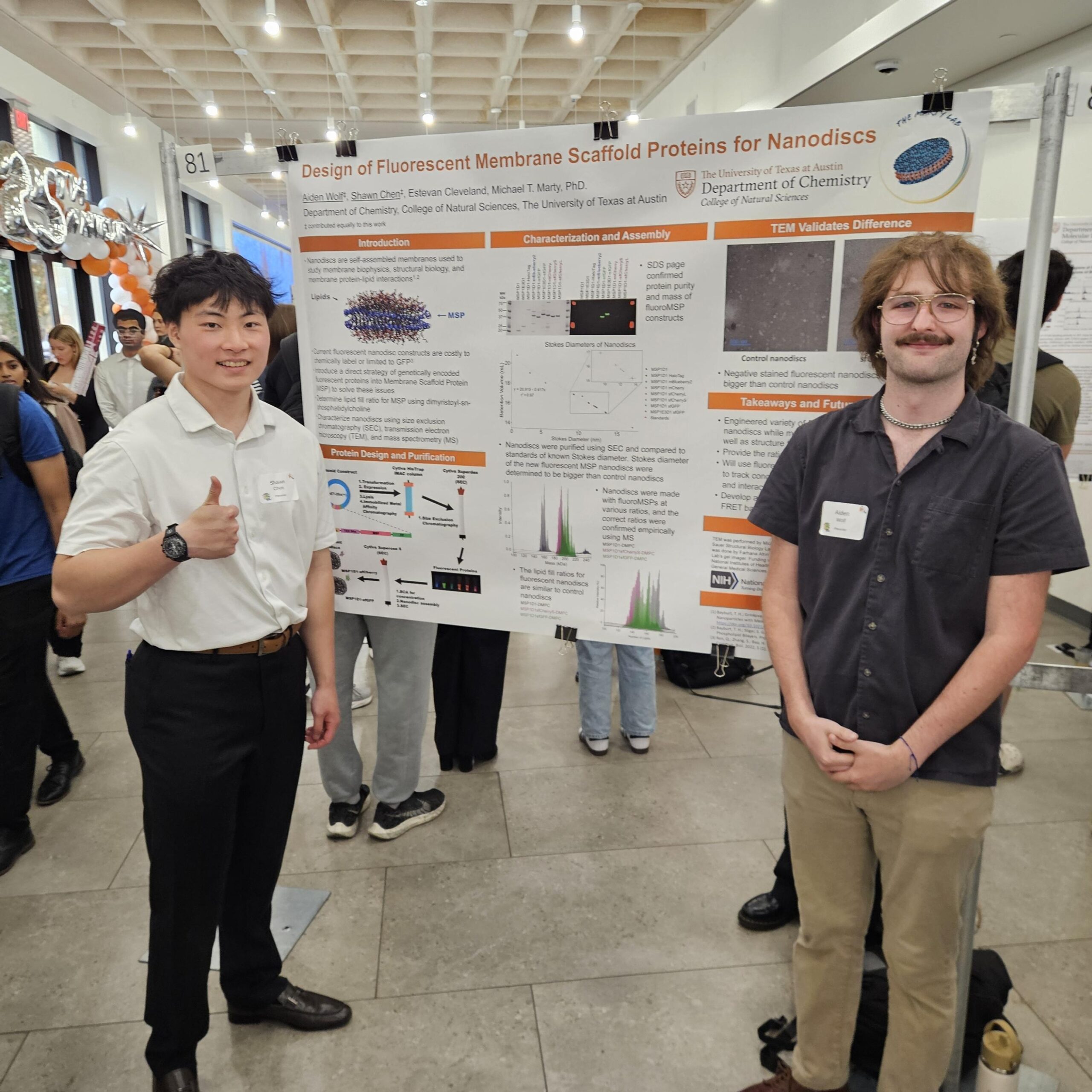 Shawn (left) and Aiden (right) standing in front of their poster on their work in designing and characterizing fluorescent membrane scaffold protein. 
