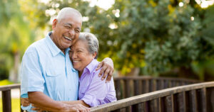 Older couple hugging