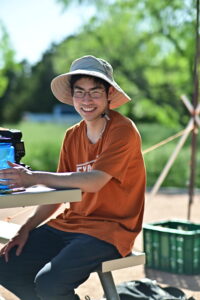 Person sitting on park bench.