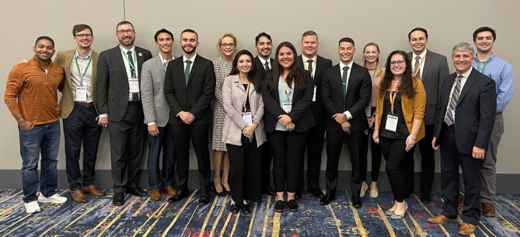 Group photo of members, sponsors, community pharmacists, and Dean Poloyac